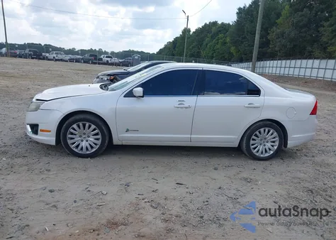 2011 Ford Fusion Hybrid из США, поврежденный, VIN 3FADP0L31BR123995